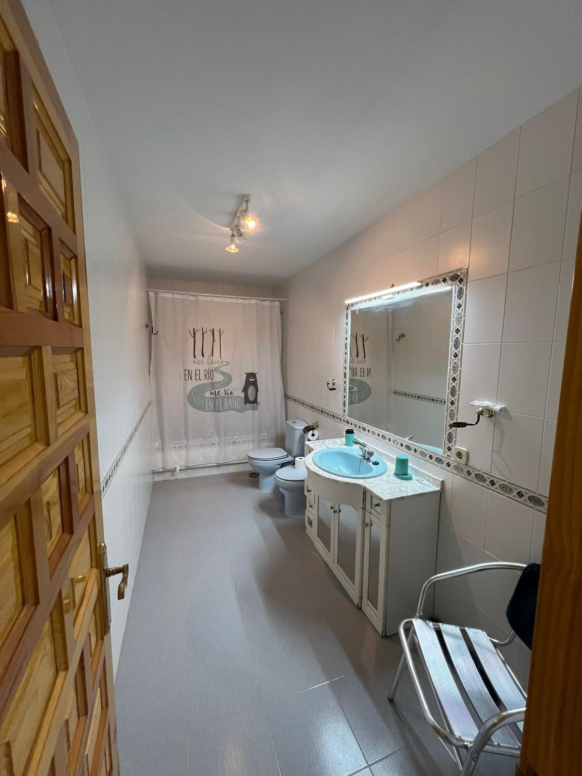 Baño de servicio para varias habitaciones